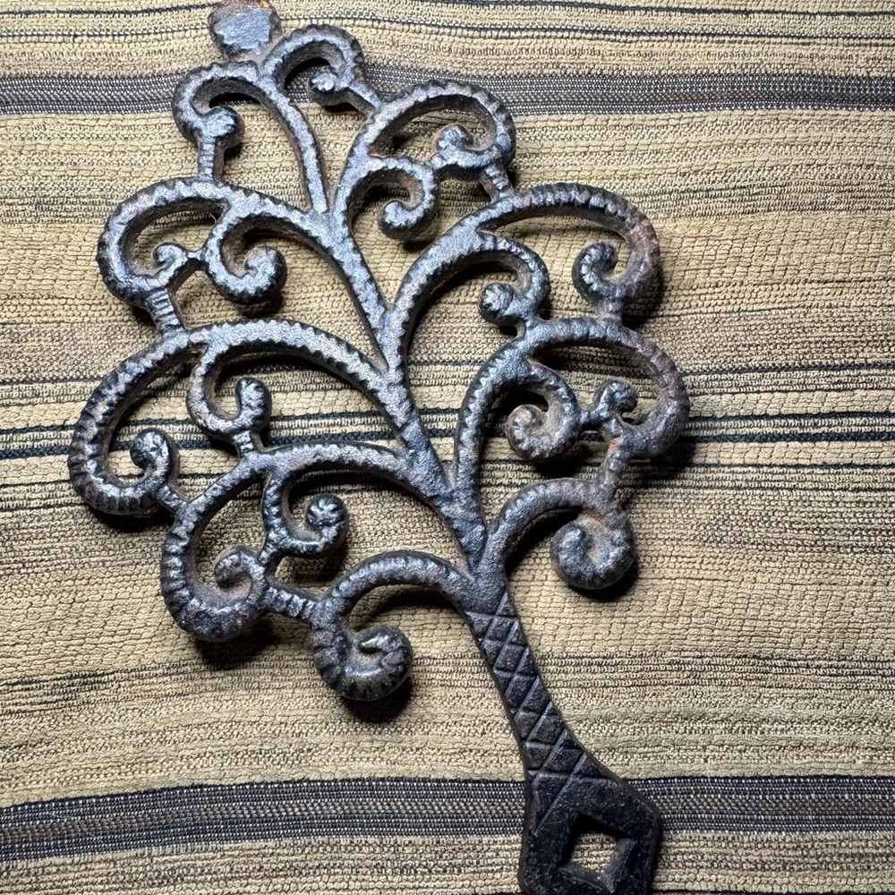 Antique Metal Trivet with Intricate Tree Design